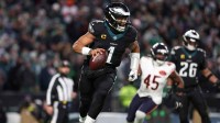 Philadelphia Eagles quarterback Jalen Hurts (1) scrambles with the ball against the Chicago Bears during the third quarter of the game at Lincoln Financial Field.