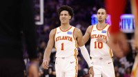 Atlanta Hawks forward Jalen Johnson (1) and forward Zaccharie Risacher (10) as a timeout is called against the Sacramento Kings during the third quarter at Golden 1 Center.