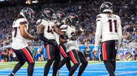 Houston Texans cornerback Jalen Mills (26), center, celebrates an interception against Detroit Lions during the second half at Ford Field in Detroit on Saturday, August 23, 2025.
