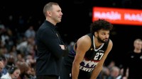 Denver Nuggets head coach David Adelman and guard Jamal Murray (27) looks on during the fourth quarter against the Memphis Grizzlies at FedExForum.