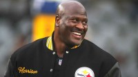 Former Steeler and Hall of Honor inductee James Harrison smiles during the Hall of Honor ceremony which took place during halftime of the Pittsburgh Steelers and Jacksonville Jaguars game at Acrisure Stadium.