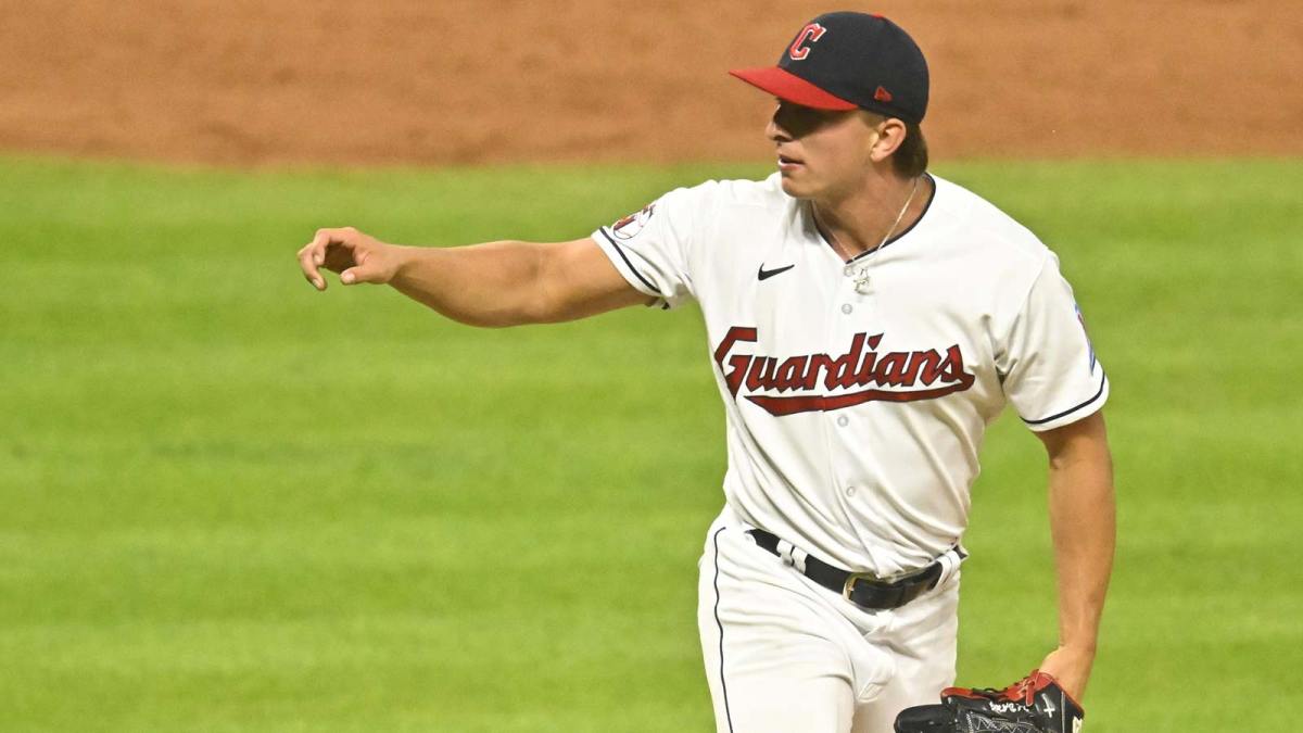 Cleveland Guardians relief pitcher James Karinchak (99) follows through on a pitch in the fifth inning against the Cincinnati Reds at Progressive Field.