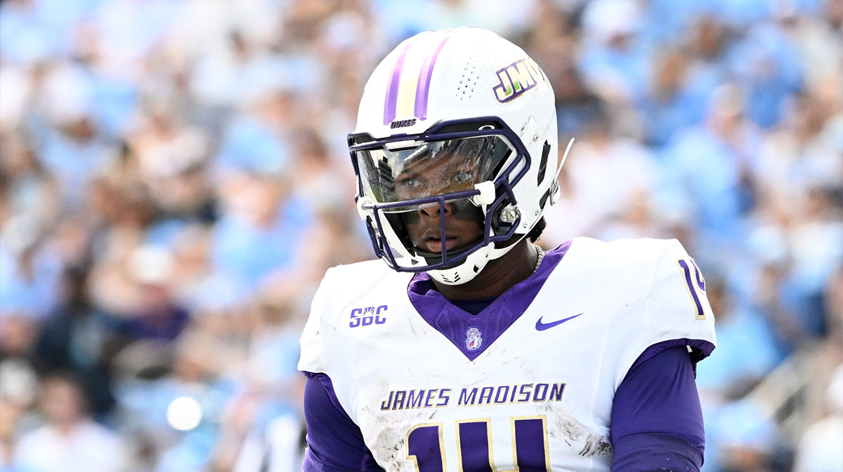 James Madison Dukes quarterback Alonza Barnett III (14) on the field in the first quarter at Kenan Memorial Stadium. 