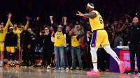 Los Angeles Lakers forward LeBron James (6) celebrates after breaking the all-time scoring record in the third quarter against the Oklahoma City Thunder at Crypto.com Arena.