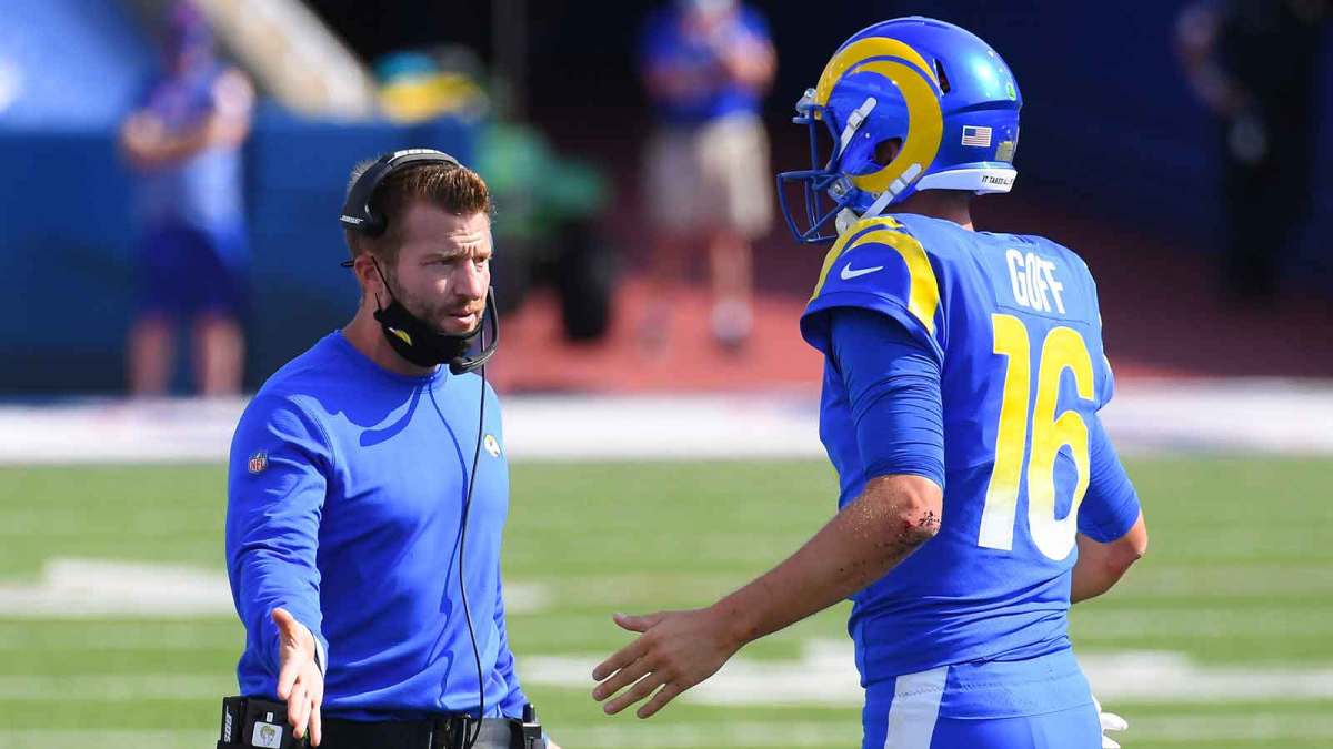 Los Angeles Rams head coach Sean McVay greets quarterback Jared Goff (16) following his touchdown run against the Buffalo Bills during the third quarter at Bills Stadium.
