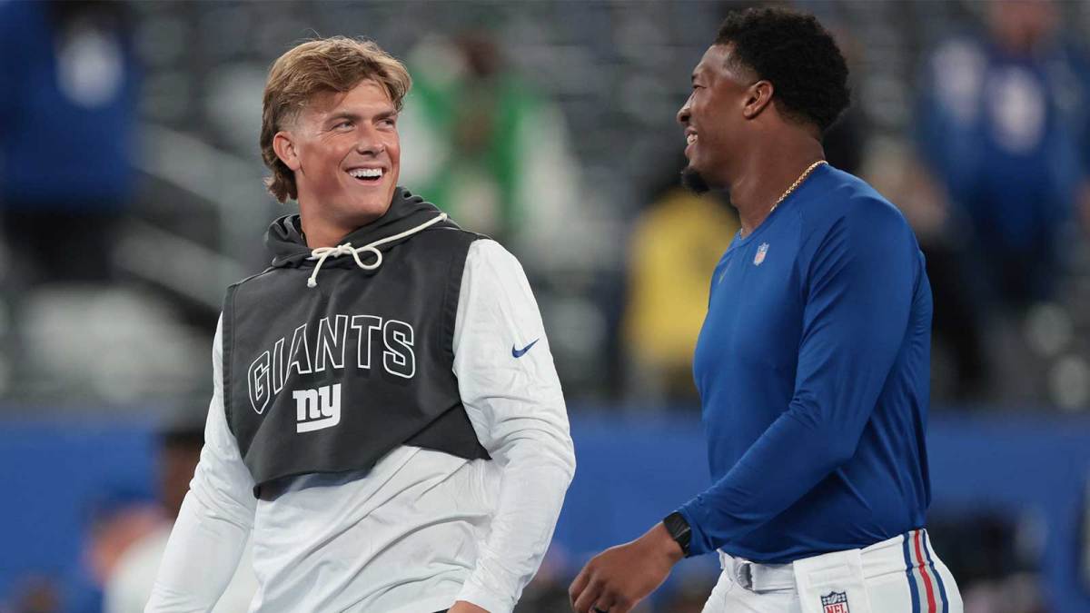 New York Giants teammates Jaxson Dart and Jameis Winston before a game against the Philadelphia Eagles.