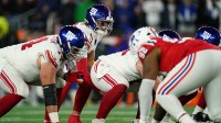 New York Giants quarterback Jaxson Dart (6) waits for the snap at the line of scrimmage in the third quarter against the New England Patriots at Gillette Stadium.