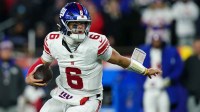 New York Giants quarterback Jaxson Dart (6) runs with the ball during the second quarter against the New England Patriots at Gillette Stadium.