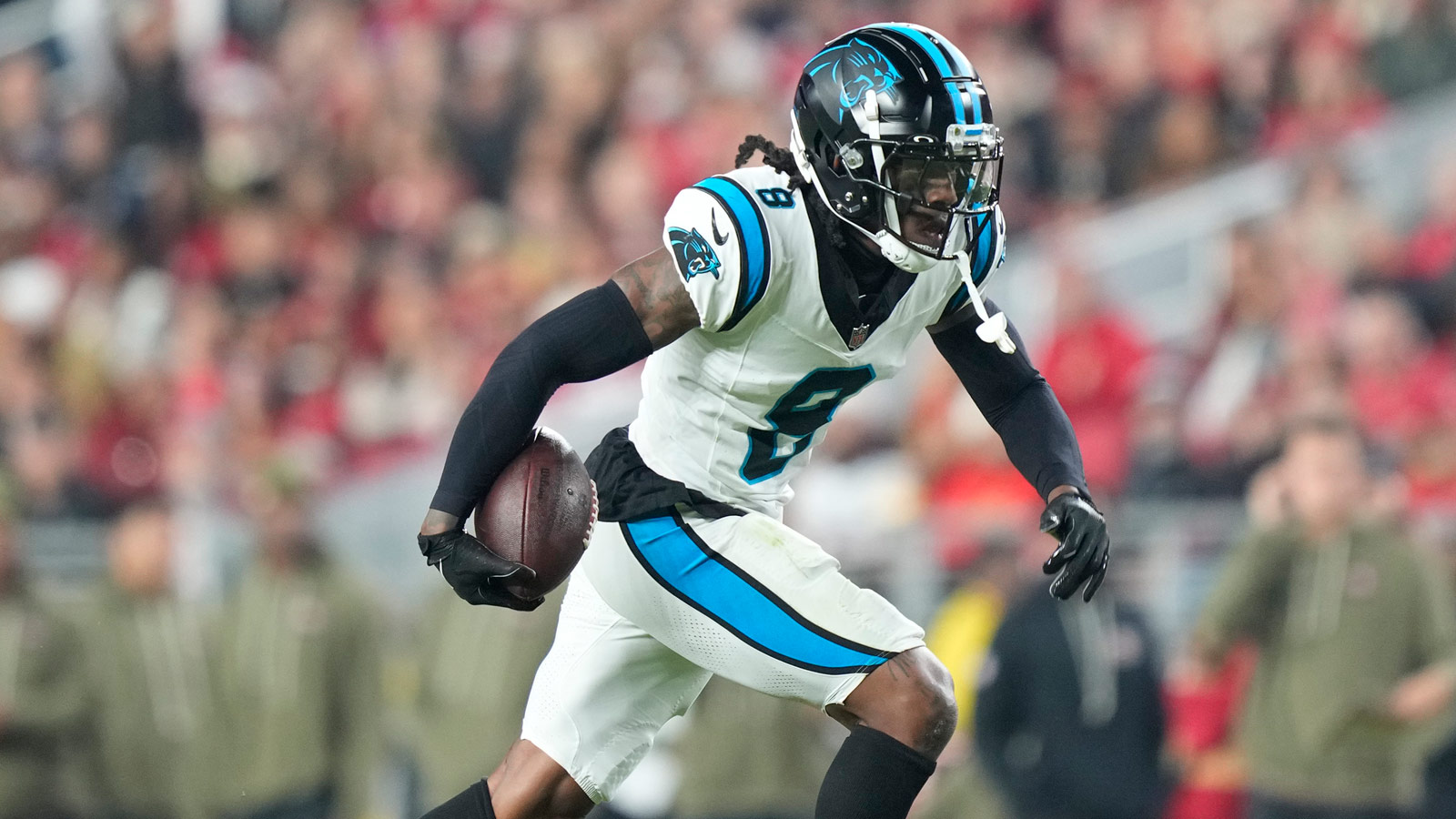 Carolina Panthers cornerback Jaycee Horn (8) catches an interception against the San Francisco 49ers during the first half at Levi's Stadium.
