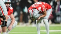 Ohio State Buckeyes kicker Jayden Fielding (38) reacts following a missed field goal during the Big Ten Conference championship game against the Indiana Hoosiers at Lucas Oil Stadium in Indianapolis on Dec. 6, 2025. Ohio State lost 13-10.