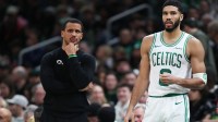 Boston Celtics head coach Joe Mazzulla and Boston Celtics forward Jayson Tatum (0) react during the first half against the Memphis Grizzlies at TD Garden