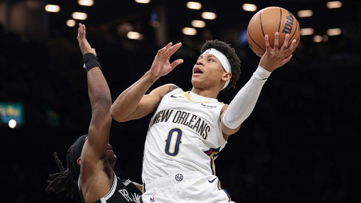 New Orleans Pelicans guard Jeremiah Fears (0) drives to the basket against Brooklyn Nets guard Terance Mann (14) during the first quarter at Barclays Center.