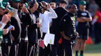 New York Jets head coach Aaron Glenn looks on during the third quarter of a NFL football matchup at EverBank Stadium.