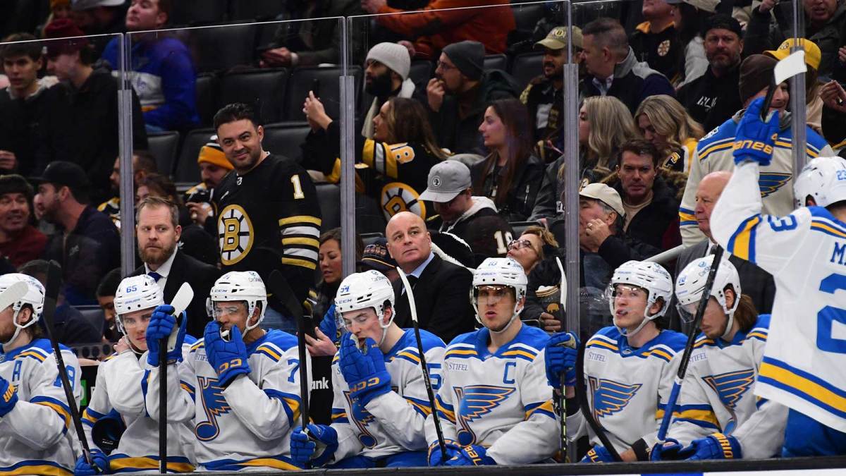 St. Louis Blues head coach Jim Montgomery behind the bench at the start of the third period against the Boston Bruins at TD Garden.
