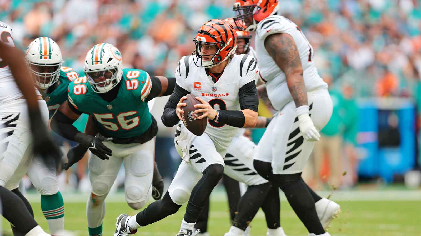 Cincinnati Bengals quarterback Joe Burrow (9) looks to make a pass during the third quarter against the Cincinnati Bengals at Hard Rock Stadium.