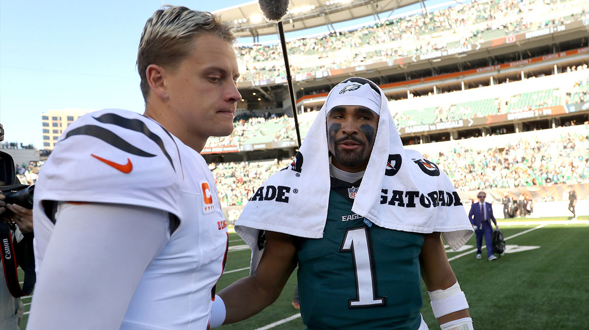 Cincinnati Bengals quarterback Joe Burrow (9) and Philadelphia Eagles quarterback Jalen Hurts (1) meet after the game Paycor Stadium.