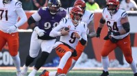 Cincinnati Bengals quarterback Joe Burrow (9) runs the ball during the first quarter against the Baltimore Ravens at Paycor Stadium.