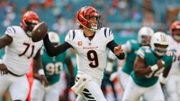 Cincinnati Bengals quarterback Joe Burrow (9) runs the ball during the first quarter against the Cincinnati Bengals at Hard Rock Stadium.