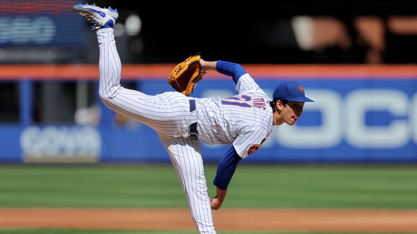 New York Mets starting pitcher Jonah Tong (21) follows through on a pitch against the San Diego Padres during the third inning at Citi Field.