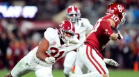 Alabama 's Keon Keeley (31) sacks Oklahoma's John Mateer (10) during the College Football Playoff game between the University of Oklahoma Sooners (OU) and the Alabama Crimson Tide at the Gaylord Family – Oklahoma Memorial Stadium in Norman, Okla., Friday Dec. 19, 2025.