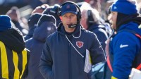 Chicago Bears head coach Ben Johnson walks along the sideline during the first quarter against the Cleveland Browns at Soldier Field.