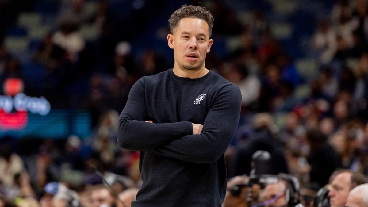 San Antonio Spurs Head Coach Mitch Johnson looks on against the New Orleans Pelicans during the first half at Smoothie King Center.