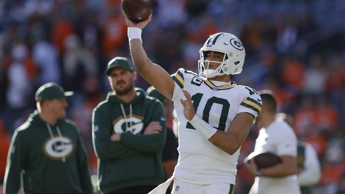 Green Bay Packers quarterback Jordan Love (10) warms up before a game against the Denver Broncos at Empower Field at Mile High.