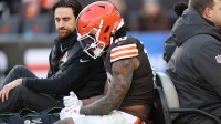 Cleveland Browns running back Quinshon Judkins (10) is carted off the field after going down with an apparent injury against the Buffalo Bills during the first half at Huntington Bank Field.