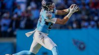 Tennessee Titans tight end Gunnar Helm (84) receives a pass during the third quarter against the Jacksonville Jaguars at Nissan Stadium in Nashville, Tenn.