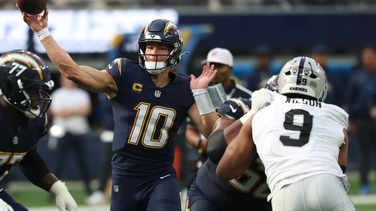 Los Angeles Chargers quarterback Justin Herbert (10) drops back to pass against the Las Vegas Raiders during the first half at SoFi Stadium.