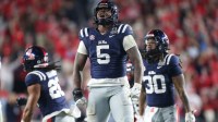 Ole Miss Rebels defensive end Kam Franklin (5) celebrates a defensive play against the Tulane Green Wave during the second half of a game at Vaught-Hemingway Stadium.