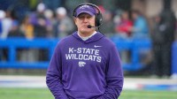 Kansas State Wildcats head coach Chris Klieman on the sidelines against the Kansas Jayhawks during the first half of the game at David Booth Kansas Memorial Stadium.