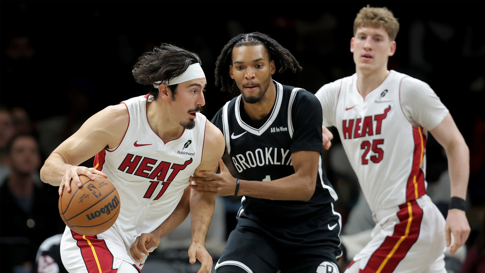 Miami Heat forward Jaime Jaquez Jr. (11) controls the ball against Brooklyn Nets forward Ziaire Williams (1) during the first quarter at Barclays Center. 