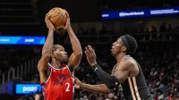 LA Clippers forward Kawhi Leonard (2) controls the ball against Atlanta Hawks forward Onyeka Okongwu (17) during the second half at State Farm Arena.