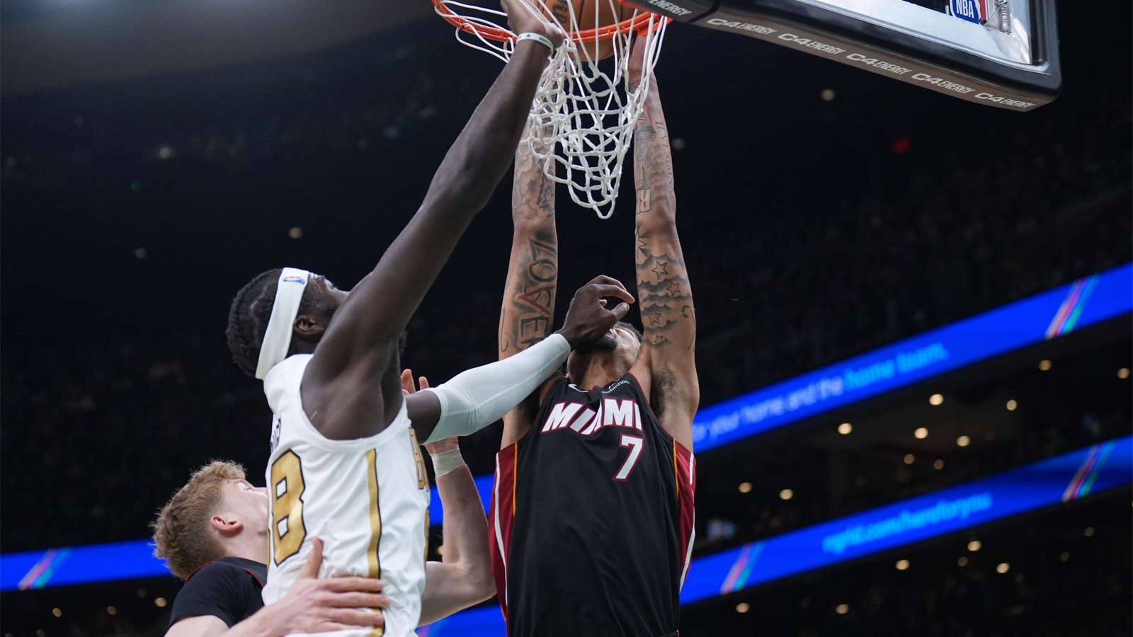 Boston Celtics center Neemias Queta (88) defends against Miami Heat center Kel'El Ware (7) in the first quarter at TD Garden.