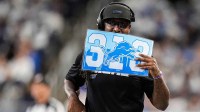 Detroit Lions defensive coordinator Kelvin Sheppard watches a play against Dallas Cowboys during the second half at Ford Field in Detroit on Thursday, Dec. 4, 2025.