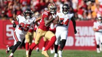 San Francisco 49ers wide receiver Kendrick Bourne (84) runs for a gain past Tampa Bay Buccaneers cornerback Jacob Parrish (25) during the second quarter at Raymond James Stadium.