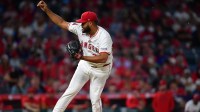 Los Angeles Angels pitcher Kenley Jansen (74) throws against the Houston Astros during the ninth inning at Angel Stadium.
