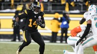 Pittsburgh Steelers running back Kenneth Gainwell (14) runs during the third quarter against the Miami Dolphins at Acrisure Stadium.
