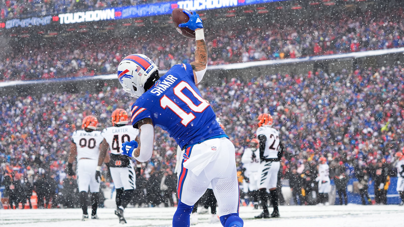 Khalil Shakir celebrating after scoring a touchdown during the Buffalo Bills' game against the Cincinnati Bengals.