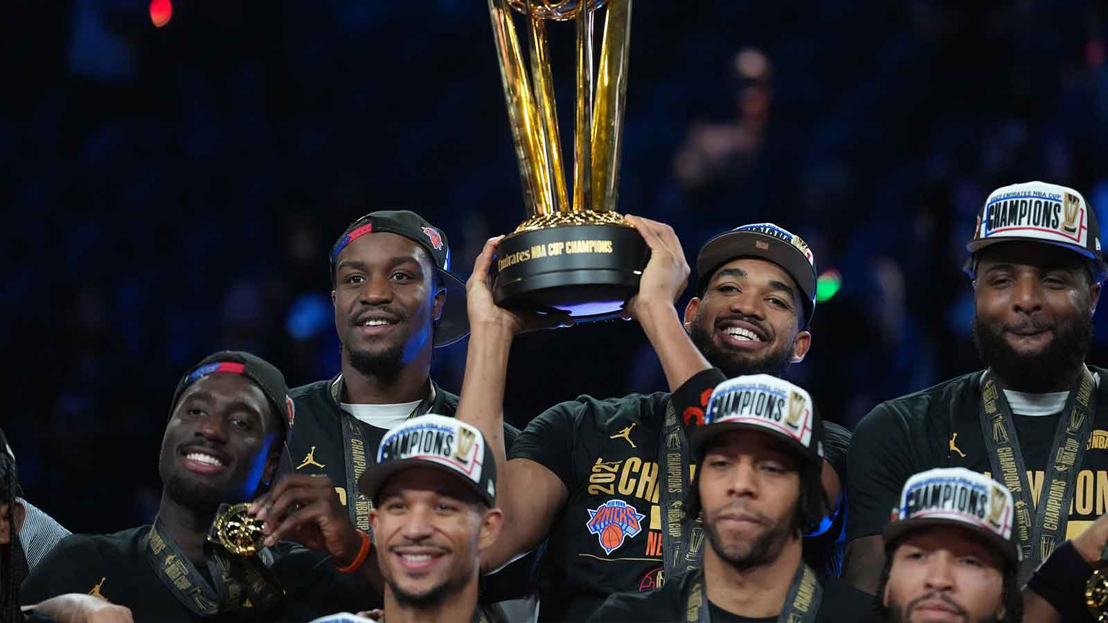 Knicks center Karl-Anthony Towns (32) and teammates react after winning the Emirates NBA Cup Final at T-Mobile Arena