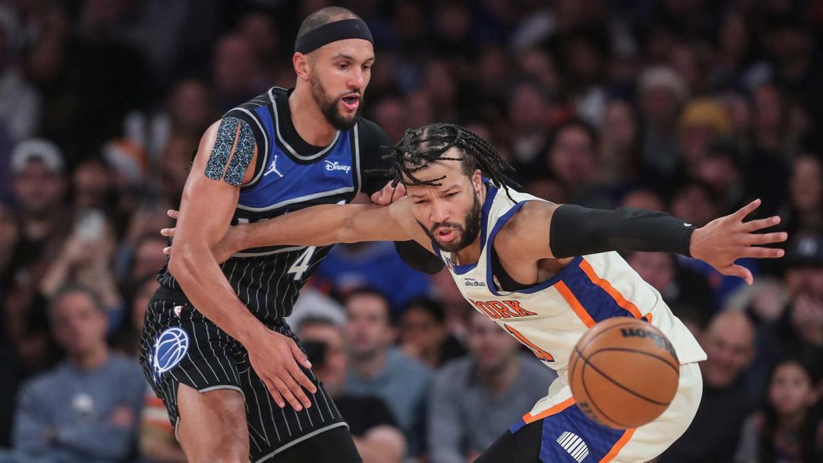 Orlando Magic guard Jalen Suggs (4) knocks the ball away from New York Knicks guard Jalen Brunson (11) in the fourth quarter at Madison Square Garden.