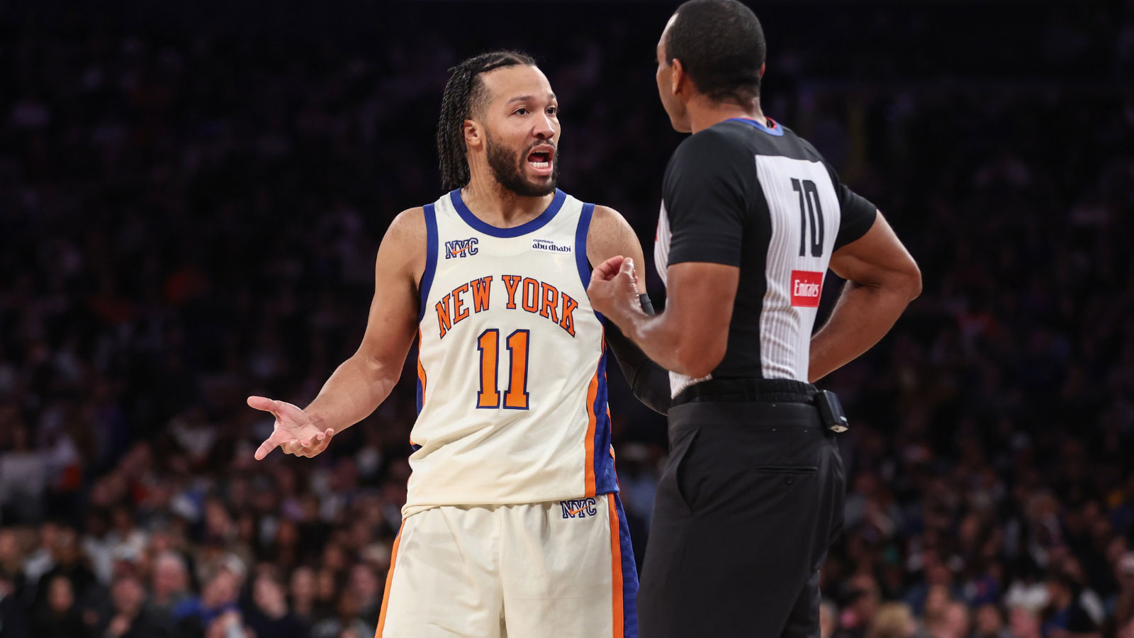 Knicks guard Jalen Brunson (11) argues with referee Phenizee Ransom (70) in the fourth quarter against the Miami Heat at Madison Square Garden