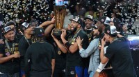 The New York Knicks react after winning the Emirates NBA Cup Final at T-Mobile Arena.