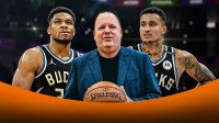 Knicks Leon Rose, Bucks Giannis Antetokounmpo looking frustrated, Bucks Kyle Kuzma with Knicks arena behind them