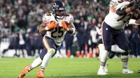 Chicago Bears running back Kyle Monangai (25) carries the ball for a touchdown against the Philadelphia Eagles during the fourth quarter of the game at Lincoln Financial Field.