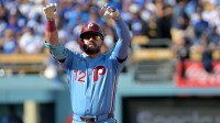 Philadelphia Phillies left fielder Kyle Schwarber (12) reacts after a double in the first inning against the Los Angeles Dodgers during game four of the NLDS round for the 2025 MLB playoffs at Dodger Stadium.