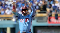 Philadelphia Phillies left fielder Kyle Schwarber (12) reacts after a double in the first inning against the Los Angeles Dodgers during game four of the NLDS round for the 2025 MLB playoffs at Dodger Stadium.