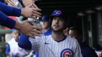 Chicago Cubs designated hitter Kyle Tucker (30) celebrates with teammates after scoring during the second inning against the San Diego Padres during game three of the Wildcard round for the 2025 MLB playoffs at Wrigley Field.