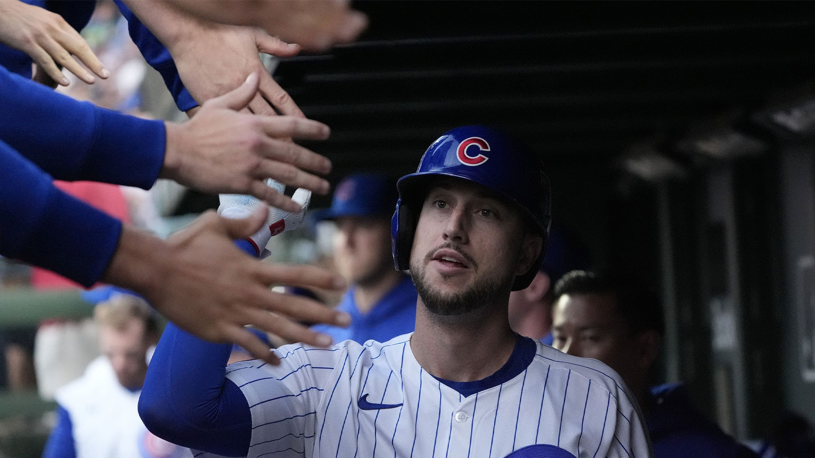 Chicago Cubs designated hitter Kyle Tucker (30) celebrates with teammates after scoring during the second inning against the San Diego Padres during game three of the Wildcard round for the 2025 MLB playoffs at Wrigley Field.